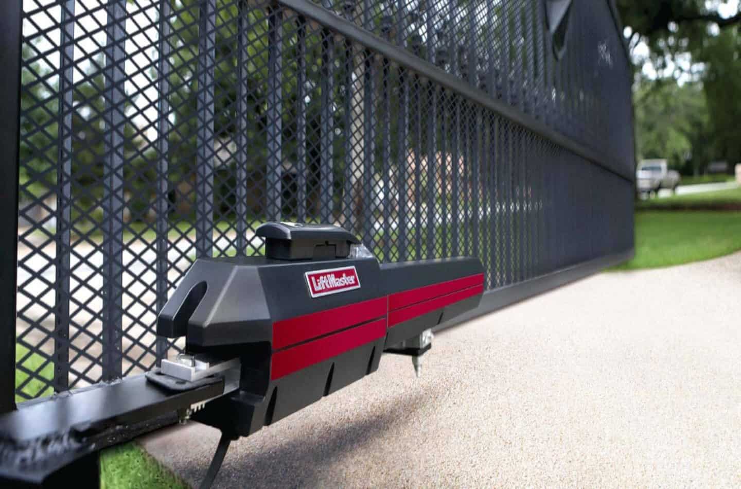 LiftMaster sliding gate operator installed and serviced by POCO Garage Doors on a residential driveway gate